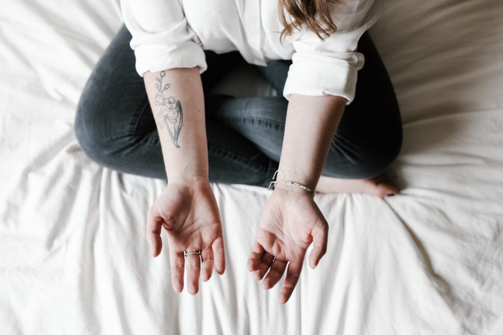hands with tattoo arm