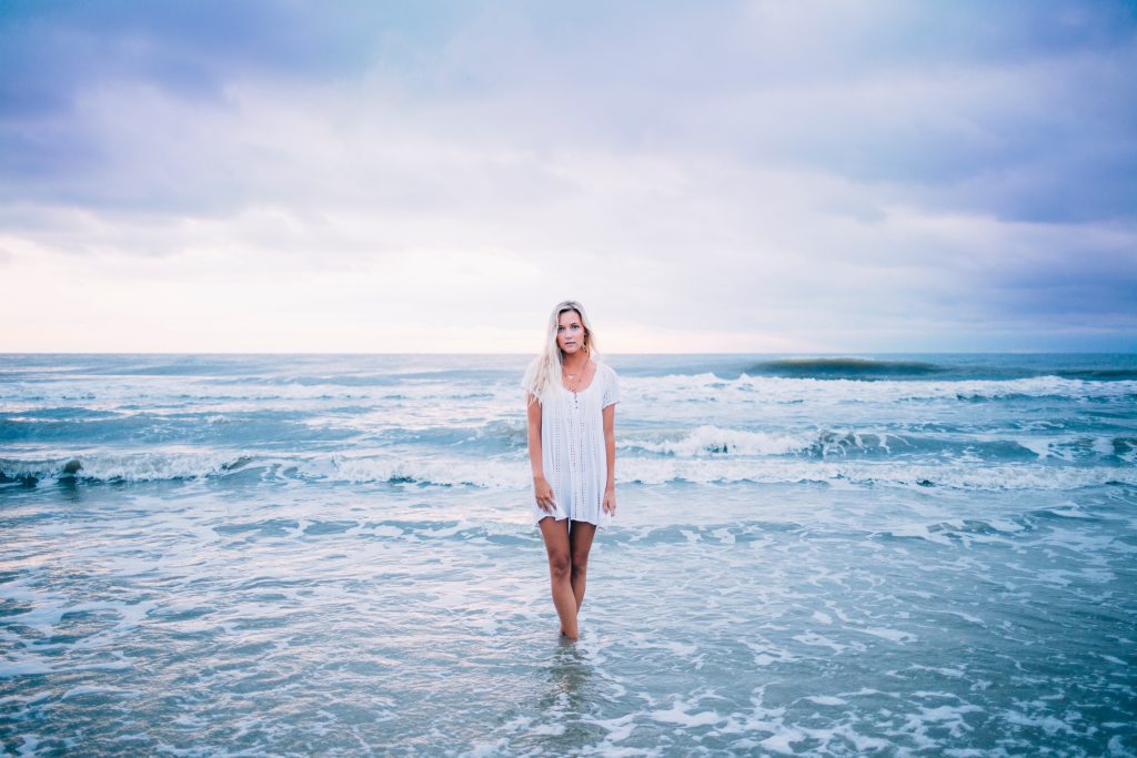 woman standing in the sea